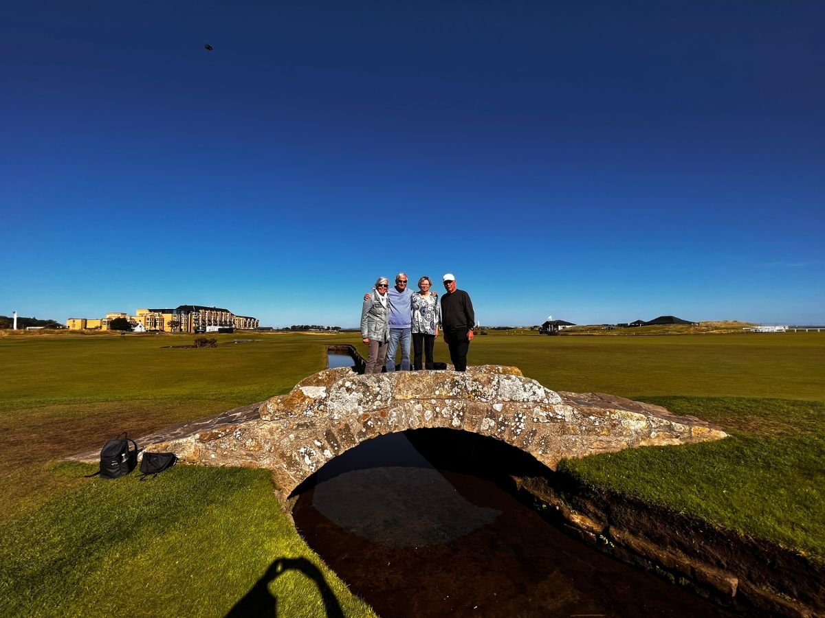 Swilcan Bridge at The Old Course St Andrews Here is some of our clients at tour guide scotland standing on the Swilcan bridge on the old course at St Andrews