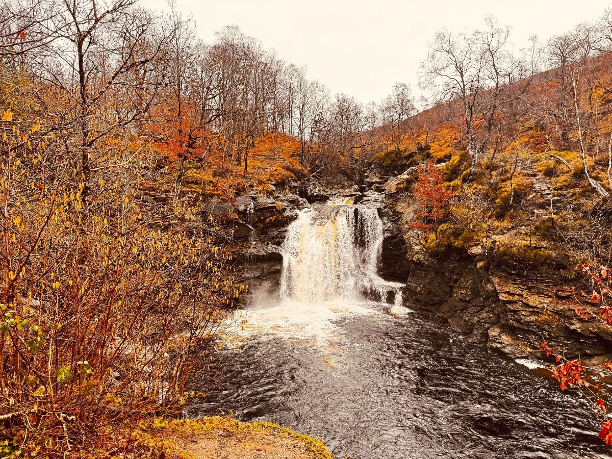 The Falls of Falloch in autum on our Glencoe & Loch Lomond day tour from Glasgow with Tour Guide Scotland