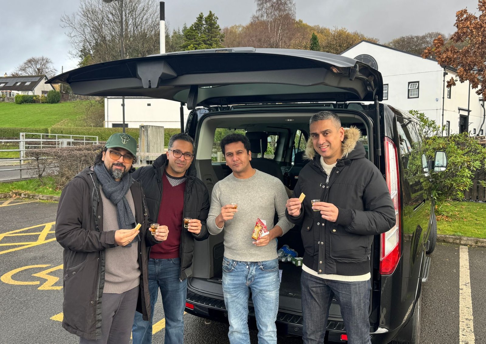 Some friends enjoying a Tailgate whisky tasting on our private day tour of The Royal Yacht Britannia & Leith whisky distillery from Edinburgh or Glasgow