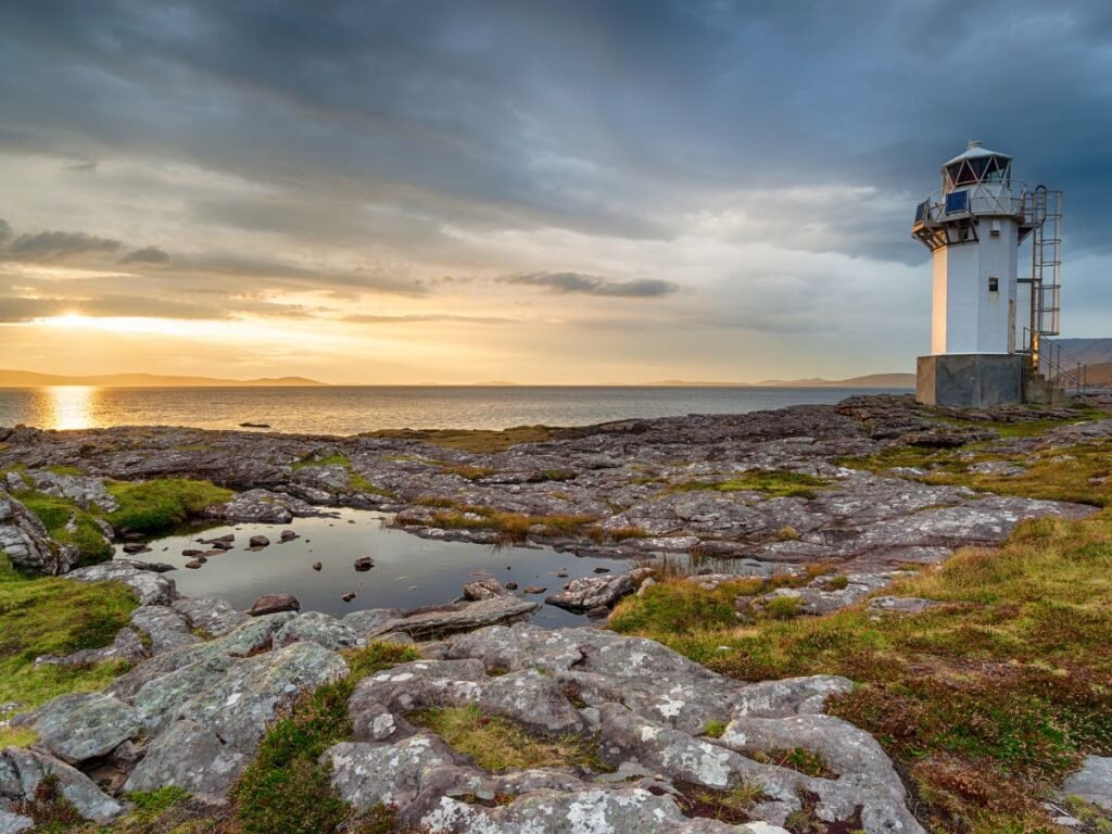 Sunset at Rhue lighthouse near Ullapool on our private tours at tourguidescotland.com