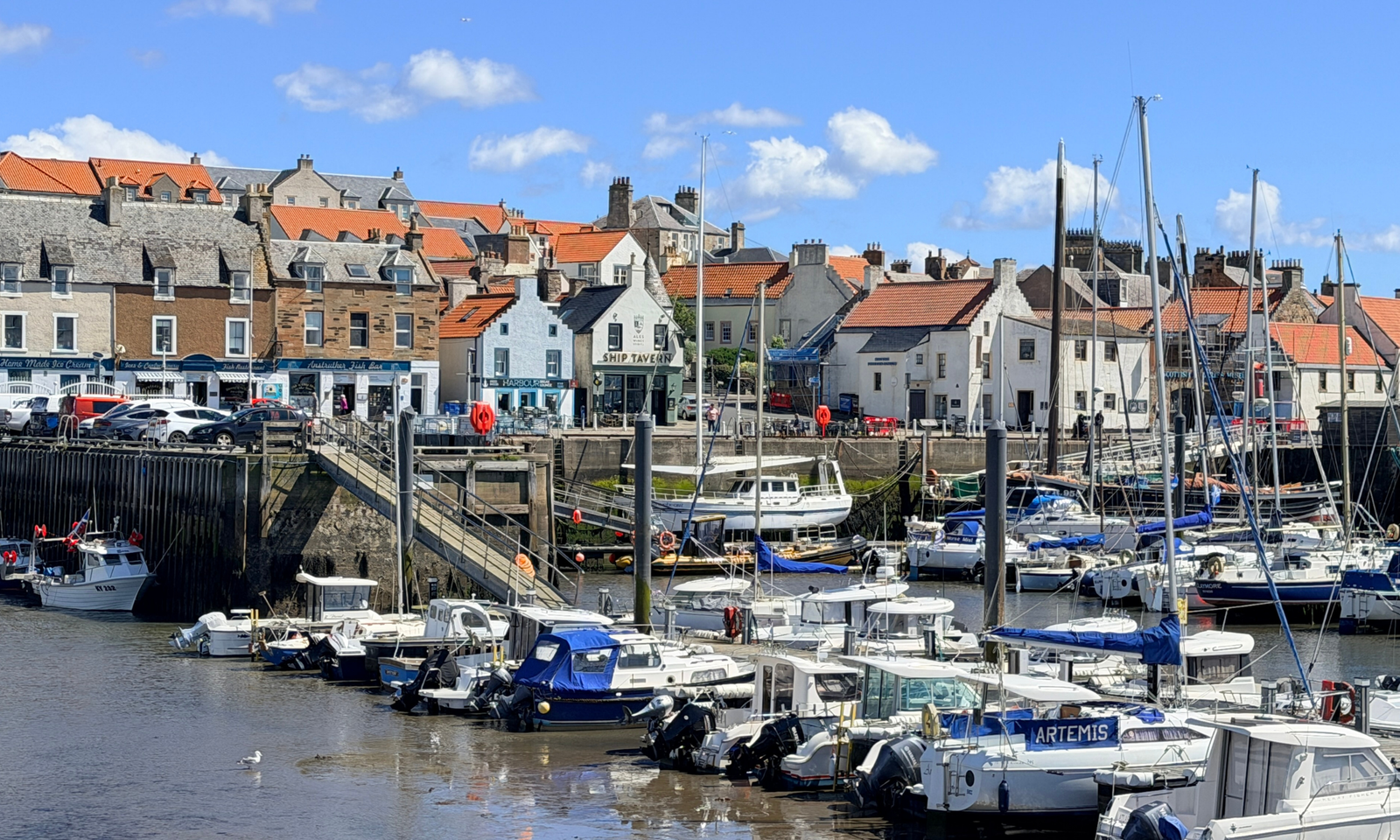 Anstruther Harbour Fishing boats and yachts moored in Anstruther Harbour, with the Fife village's colourful waterfront buildings behind