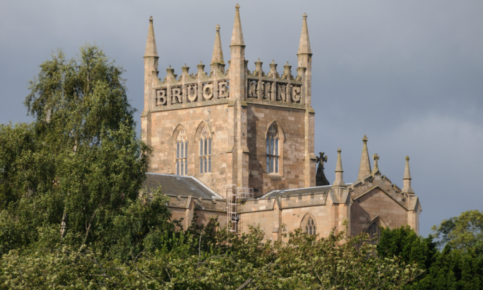 Dunfermline Abbey, "Bruce King" parapet tower Dunfermline Abbey tower with "King Robert The Bruce" carved parapet, Fife, Scotland