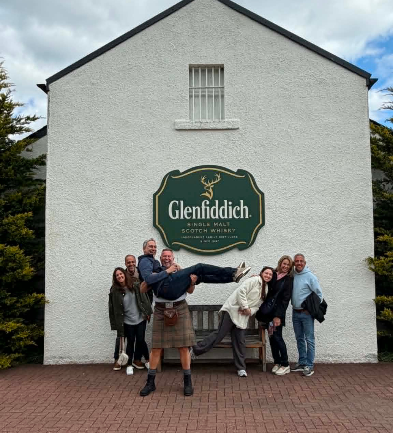 Tour guide James and guests having fun at Glenfiddich Distillery