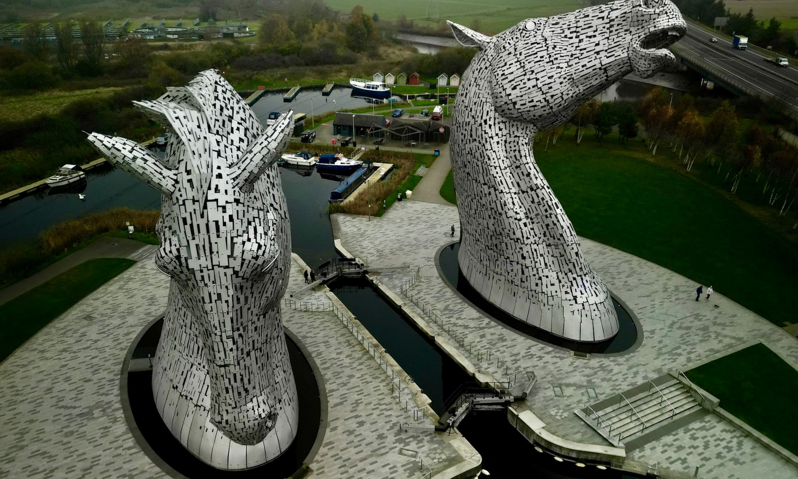 Aerial View of the Kelpies Aerial view of the Kelpies steel horse-head sculptures towering over the Forth and Clyde Canal in Falkirk
