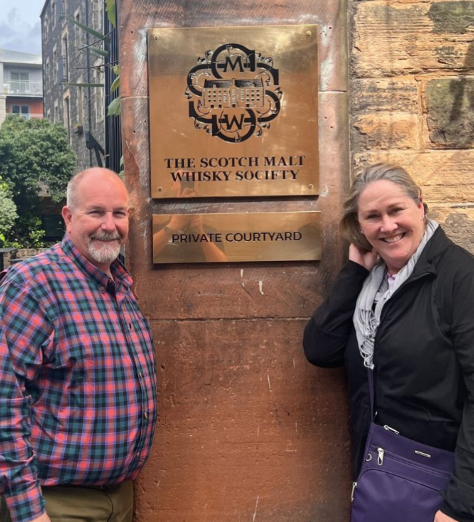 Guests at the Scotch Malt Whisky Society, Edinburgh Guests at the Scotch Malt Whisky Society entrance in Edinburgh