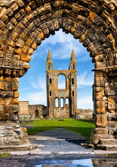 The ruined St Andrews Cathedral against the Fife coastline
